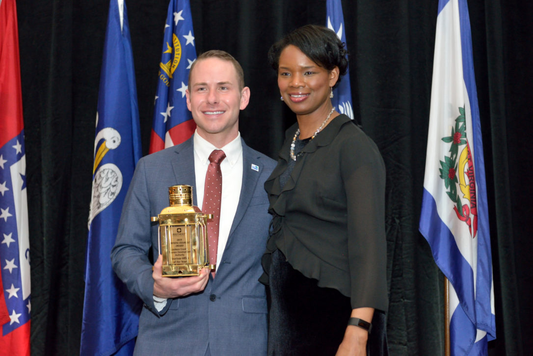 Nick Breedlove accepting award on behalf of jackson county